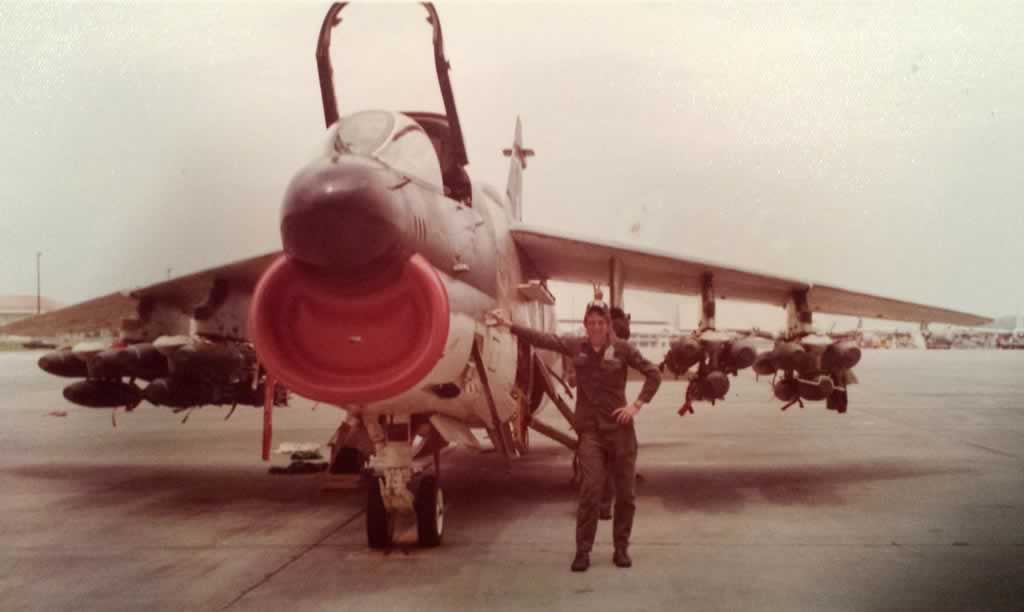 Sgt Kenny Brown with loaded A7-D during TDY to Panama, 1974